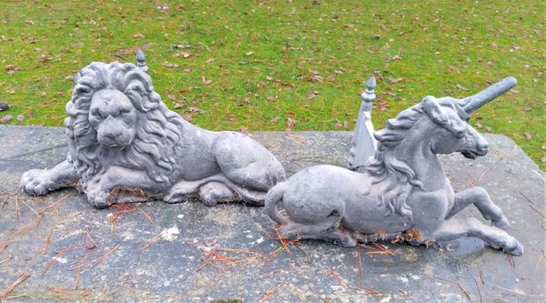 A pair of lion and unicorn bootscrapers