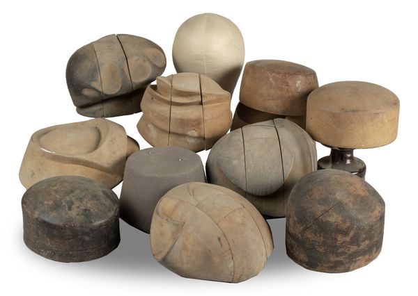 A collection of hat makers moulds