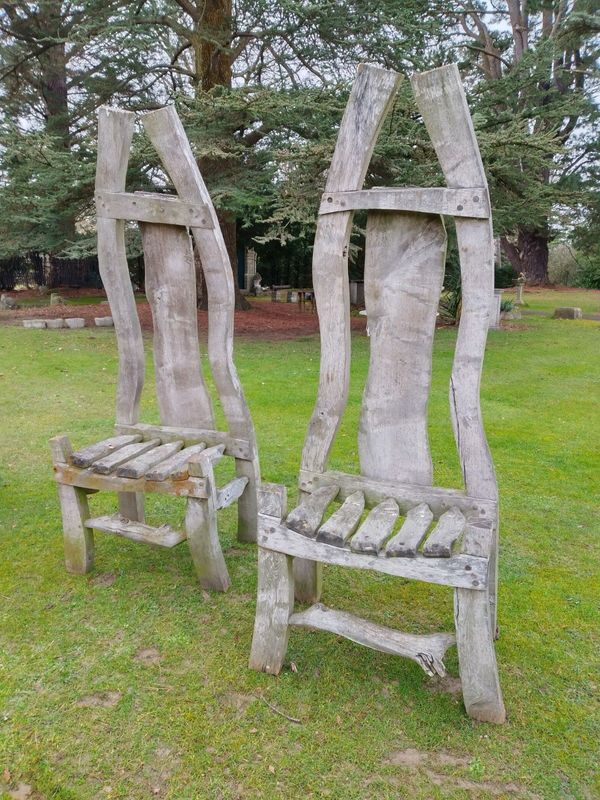 A pair of massive oak chairs
