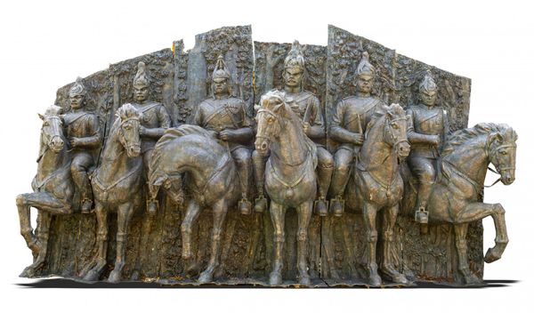 A monumental and impressive bronze patinated fibreglass wall sculpture