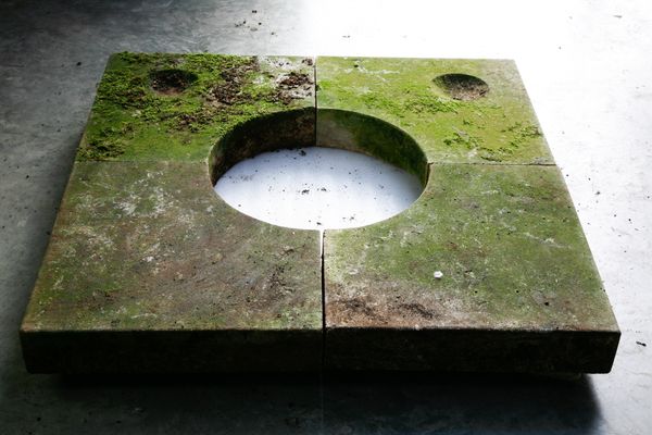 †A Vicenza stone base for a wellhead in four sections (daggered lot)