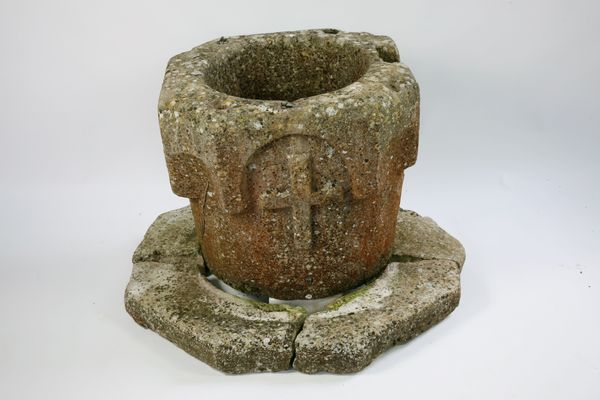 A rare early carved limestone wellhead