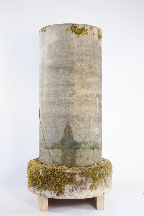 A composition stone pedestal