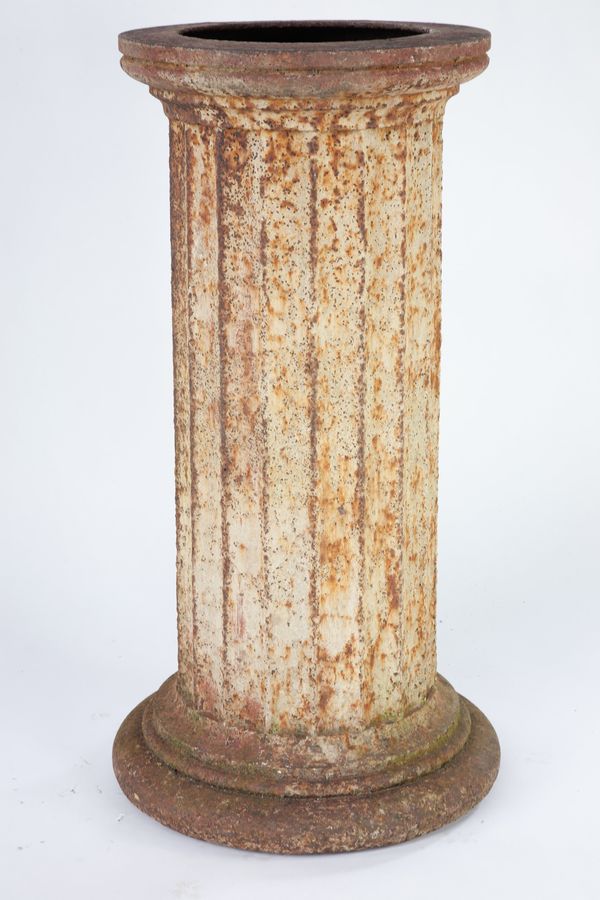 A cast iron pedestal