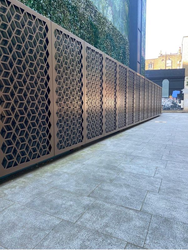 †A set of eight bronze powder-coated steel panels (daggered lots)