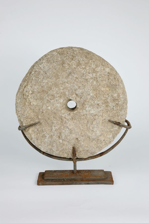 A currency stone disk