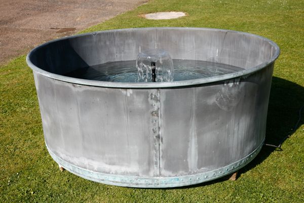 A large copper planter/water feature