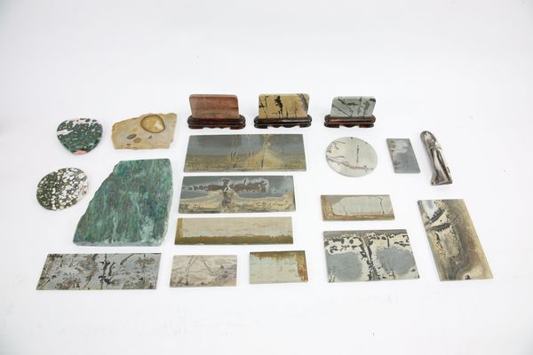 A collection of mineral specimens mainly comprising of ruin stone