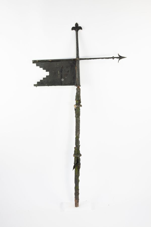 A wrought iron weathervane