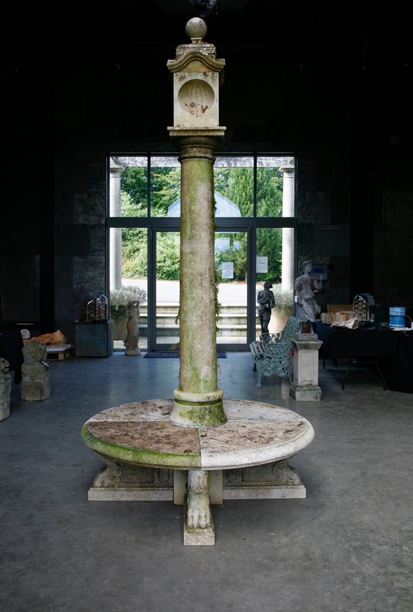 † A carved limestone pillar sundial (dagger lot)