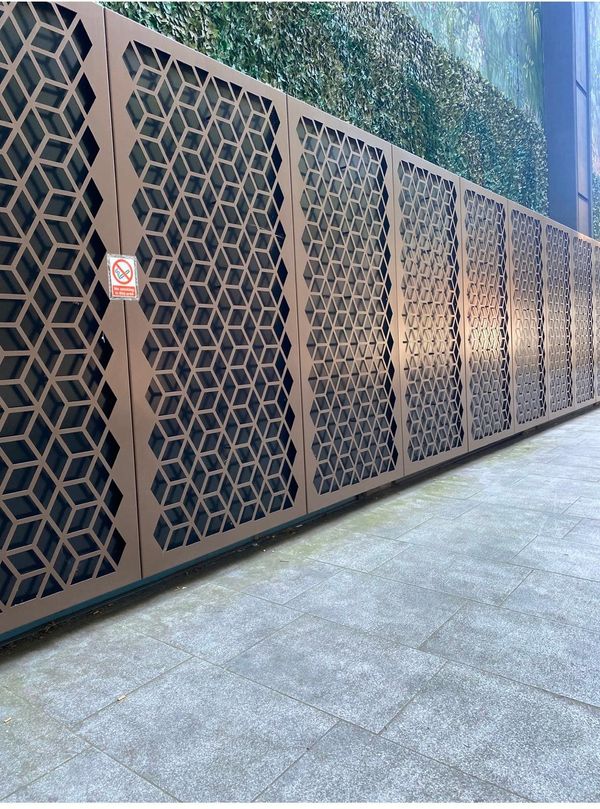 †A set of eight bronze powder-coated steel panels (daggered lot)