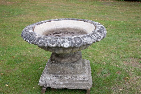 A large composition stone urn