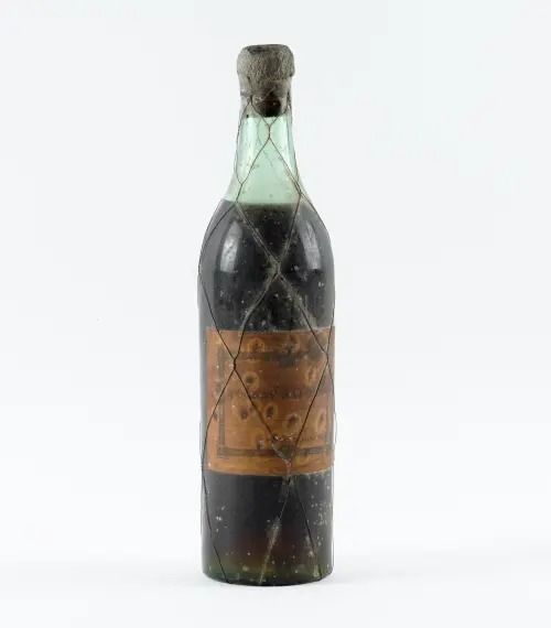A BOTTLE OF NAPOLEON COGNAC BY PIERCEL DE SAINT JACQUES